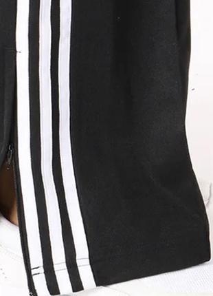 Спортивні широкі штани adidas yellow originals7 фото