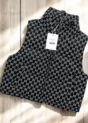 Укорочена жилетка