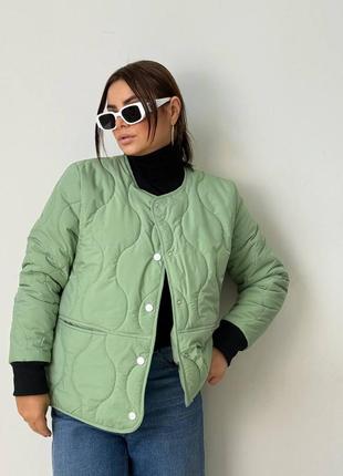 Дизайнерська стьобана куртка з кишенями
