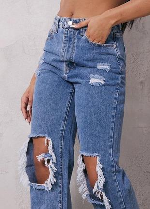 Стильные джинсы с разрезами10 фото
