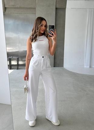 Легкі жіночі брюки палаццо з високою посадкою