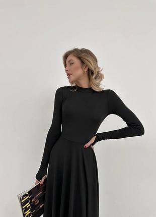 Изящное платье миди по фигуре со свободной юбкой3 фото