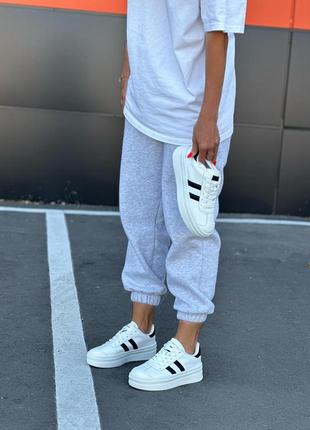 Жіночі модні кеди білі на високій підошві