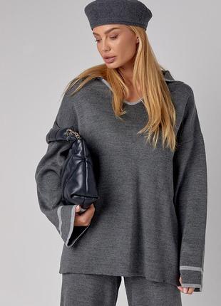 Жіночий костюм oversize з вільними штанами та кофтою-поло