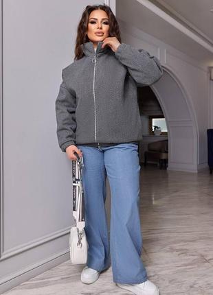 Жіноча осіння куртка великих розмірів