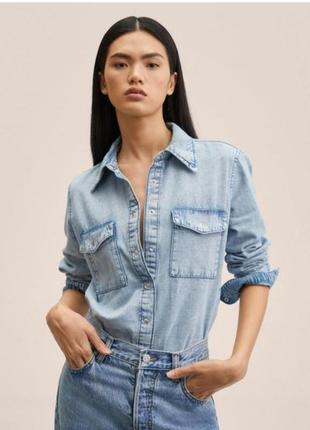 Стильна джинсова рубашка mango в розмірі s дуже класна до тіла.