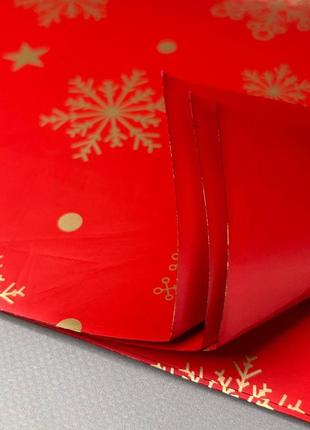 Пакувальна калька для подарунків 57х57 см, 20 аркушів - червона сніжинки1 фото