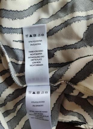 Блузка с принтом зебры.7 фото