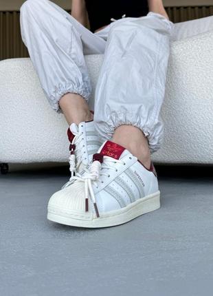 Стильні жіночі кросівки високої якості в стилі adidas superstar white/red10 фото