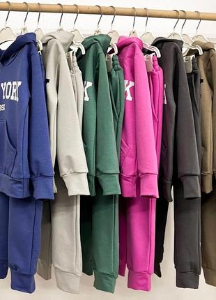 Дитячі спортивні костюми для хлопчика та дівчинки