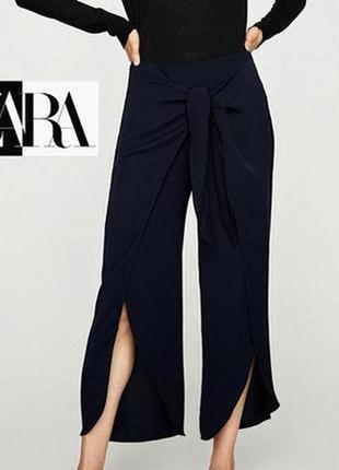 Эпатажные оригинального дизайна брюки известного испанского бренда zara