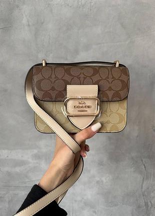 Шкіряна сумка в стилі coach