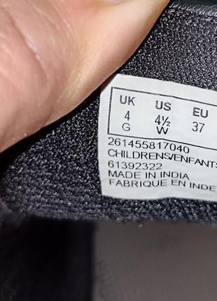 Масивні шкіряні кросівки