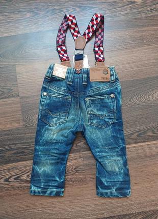 Новые детские джинсы5 фото