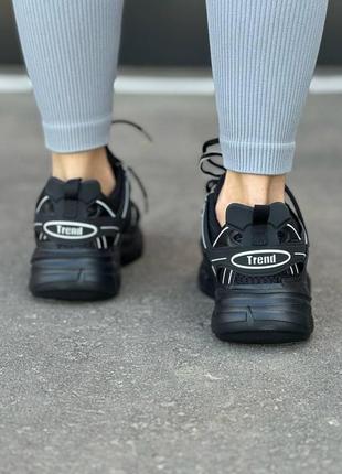 Женские кроссовки черного цвета5 фото