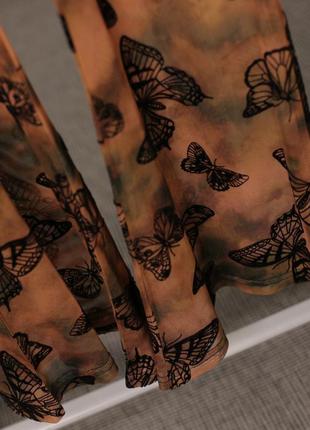 Невероятные прозрачные брюки клеш в бабочки urban outfitters3 фото