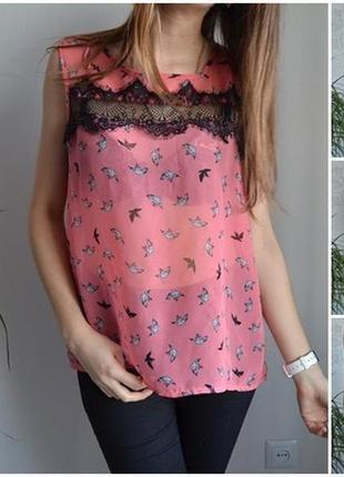 Очень красивая и стильная брендовая блузка в птичках.4 фото
