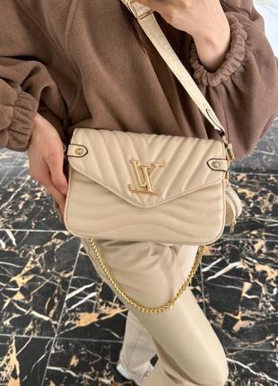 Сумка louis vuitton new wave multi pochette beige4 фото