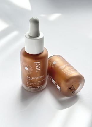 Бронзуючі краплі бронзер хайлайтер для обличчя pai skincare the impossible glow bronzing drops, 30 мл1 фото