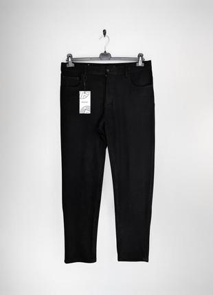 Zara стрейчева модель брюк. у глибоко чорному кольорі.