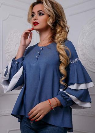 Синя блуза з воланами