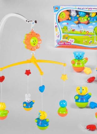 Карусель на кроватку для новорожденных с пластмассовыми игрушками