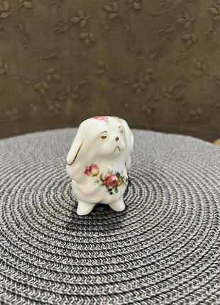Фарфоровая статуэтка собака пекинес шпиц