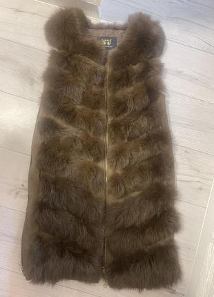 Женская жилетка из натурального меха