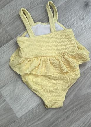 Желтый слитный детский купальник 9-12 м2 фото