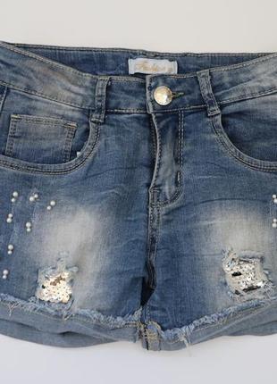 Нарядные джинсовые шорты девочке биссер пайетки рванные шорты1 фото