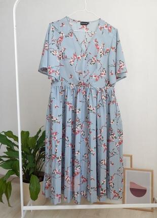 Ніжна вишукана сукня міді із плісованою спідницею в складку