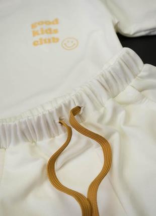Летний комплект детский шорты и футболка оверсайз, костюм летний детский бежевый молочный7 фото