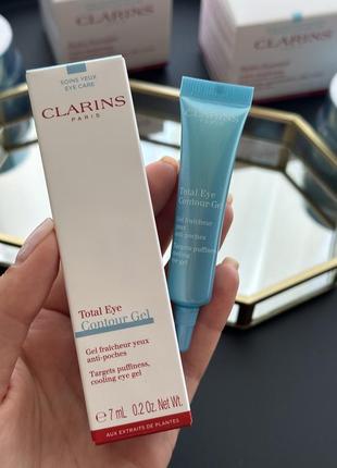 Охолоджувальний гель для усунення слідів втоми навколо очей clarins total eye contour gel.