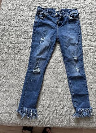 Стрейчевые скинни с бахромой