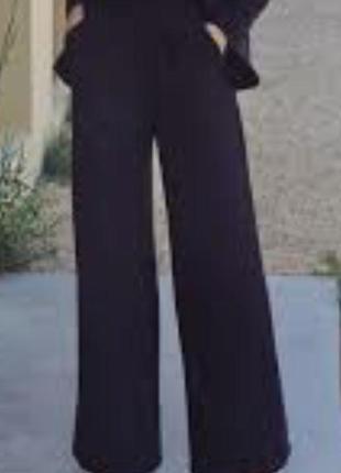 Черные брюки палаццо