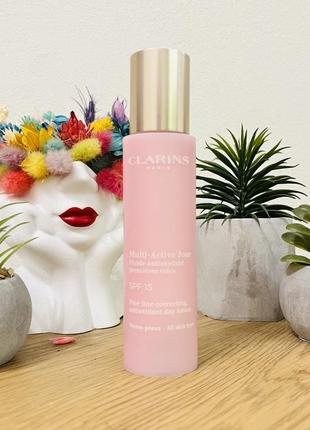 Оригінал clarins multi-active jour fluide spf 15 флюїд для будь-якого типу шкіри