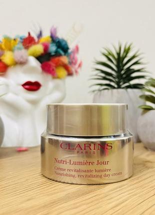 Оригінал денний омолоджувальний крем clarins nutri-lumière day cream