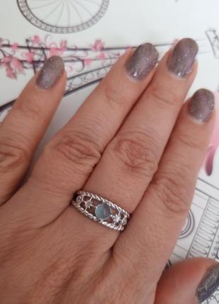 Серебряное кольцо с голубым кабошоном8 фото