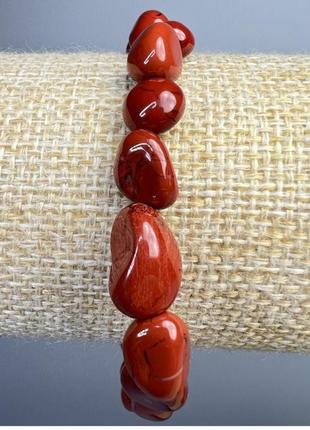 Браслет красный яшма натуральный камень галатика d-9х11мм+- l-18см+ (стрейч)