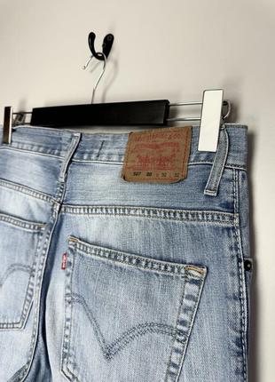 Levi’s 507 00 винтажные джинсы из голубого денима имеют фабричные потертости + клешевые штанины.2 фото