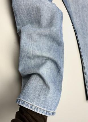 Levi’s 507 00 винтажные джинсы из голубого денима имеют фабричные потертости + клешевые штанины.4 фото