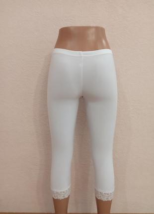 Білі  жіночі легінси з мереживними манжетами,з штучної тканини, розмір м6 фото