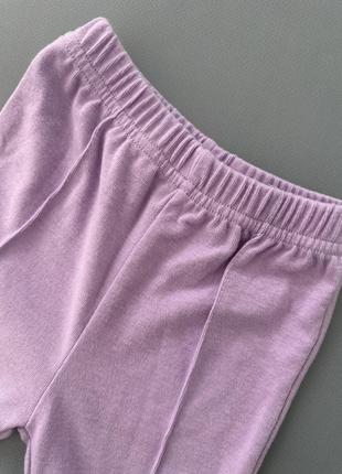 Трикотажные фиолетовые брюки клеш2 фото
