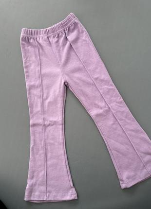 Трикотажные фиолетовые брюки клеш