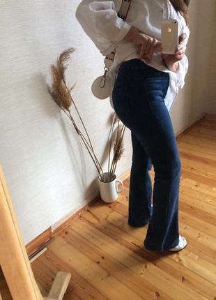 Женские синие  расклешённые джинсы calzedonia4 фото