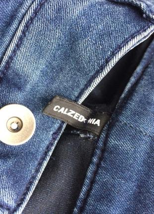 Женские синие  расклешённые джинсы calzedonia7 фото
