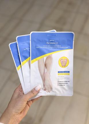 Пілінг-шкарпетки для ніг jigott vita solution 12 brightening foot peeling pack
