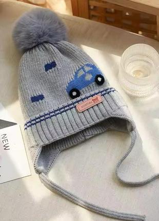 Шапка шапочка с завязками и помпоном закрывает ушки зима1 фото