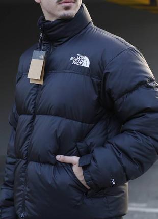 Пуховик north face.