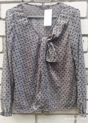 Блузка фирмы mango, страна производитель испания.